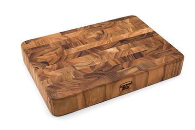 Made of gorgeous Acacia hardwood, this Rectangular End Grain Cutting Board is functional and beautiful due to its rich, shimmering colors. Unlike traditionally made boards, end grain construction is less dulling to cutlery because the wood grain direction