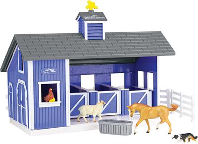 Breyer Farms™ has an exciting new playset - Home at the Barn! This beautiful blue, 3-stall barn comes complete with fencing, a dog, a sheep, a hen with chicks, a Stablemates horse, and water trough. 