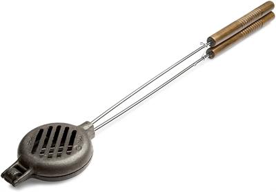 This cast iron griller is a great way to cook burgers, salmon patties and crab cakes over a campfire or firepit without the hassles of using a large grill grate.  Fill the cooking cavity with meat, close the lid and hold over the heat source.