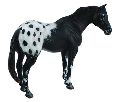Black and White spotted toy horse