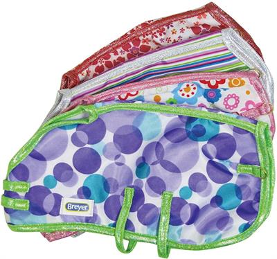 These blankets feature fun patterns like flowers, stripes, and dots, and trimmed with a sparkly trim.