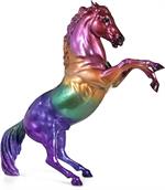 A rainbow is always a special sight to behold, but when it appears on a fiery rearing horse, it becomes something truly spectacular! This impressive stallion’s coat is decorated with rich jewel-toned hues that together make up an exquisite rainbow.