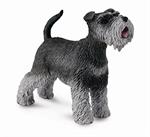Schnauzers have a double coat. The top or guard coat is wiry, while the undercoat is soft. This figurine measures 2.25