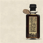 Woodinville Whiskey Company created a delicious barrel aged maple syrup from their empty bourbon and rye whiskey barrels. Pure, Grade A, Dark Amber Maple Syrup that was harvested from eastern United States is put away to age gracefully in the whiskey barr